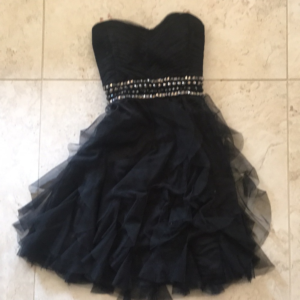 Black ruffle homecoming dress.